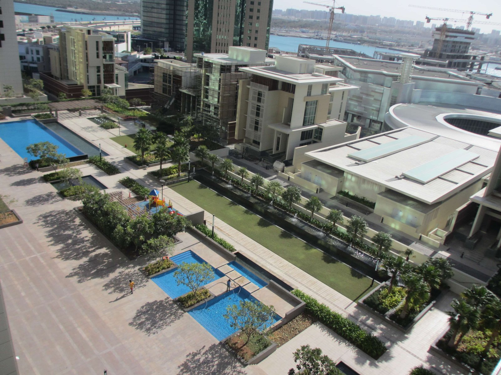 Exterior view of Al Maha Tower Marina Square Al Reem Island Abu Dhabi showcasing luxury high-rise apartments and Marina waterfront.